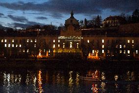 Greenpeace activists project message for CzechPM on government building in Prague