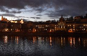 Greenpeace activists project message for CzechPM on government building in Prague