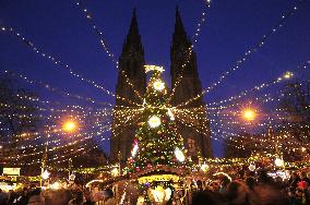 Christmas market and tree at Namesti Miru in Prague, Church of st. Ludmila