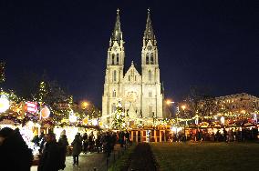 Christmas market and tree at Namesti Miru in Prague, Church of st. Ludmila