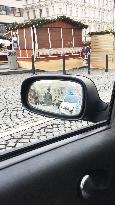 car, police control at Wenceslas Square in Prague, rear-view mirror (rearview mirror)