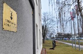 The policemen with dogs guard the surroundings of the court