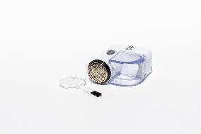 Lint remover, Includes cleaning brush