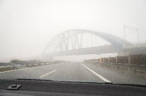 thick, heavy, dense fog, winter, European route E55, D3 motorway, steel arch railway bridge