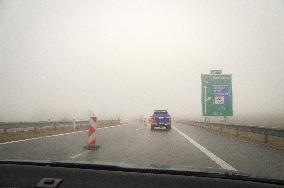 thick, heavy, dense fog, winter, European route E55, D3 motorway