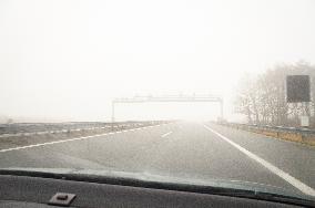 thick, heavy, dense fog, winter, European route E55, D3 motorway, toll gate, electronic toll collection