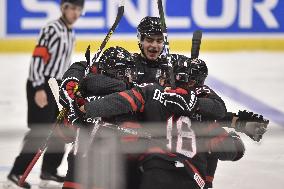 Hockey players of Canada celebrate a goal, U20