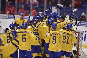 Swedish players celebrate the third place