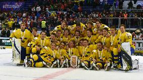 Swedish players celebrate the third place