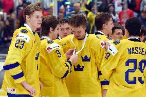 Swedish players line up with medals