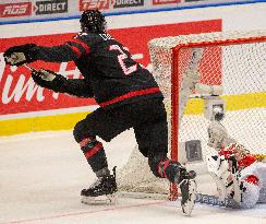 Dylan Cozens, Amir Miftakhov