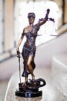 Lady Justice, allegory, justice, statuette, statue, sculpture, blindfold, eye tape, scale, scales, snake, sword