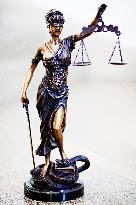 Lady Justice, allegory, justice, statuette, statue, sculpture, blindfold, eye tape, scale, scales, snake, sword