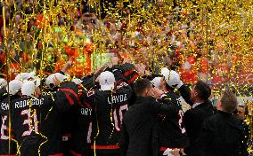 Happy Canadian players celebrate after their team won Championships