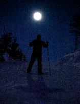 nordic skiing, winter, snow, mountains, evening, sunset, silhouette, full moon, skier