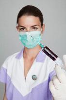 health care, nurse, nursing sister, woman, facecloth, mouth protection, syringe, blood, injection