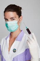 health care, nurse, nursing sister, woman, facecloth, mouth protection, syringe, blood, injection