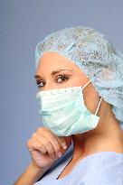 nurse with a medical cap and mask