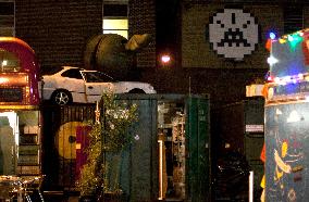 Car cemetery, graffiti, double decker bus, ball