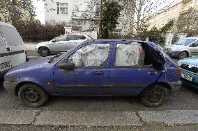 scrapped vehicle, abandoned wreckage, cracked, broken windscreen