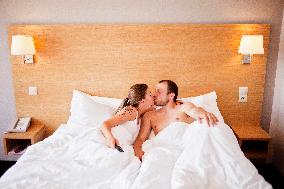 Woman, man, bed, kiss