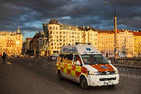 ambulance, car, nonstopmedic, healthcare, Dancing House (Ginger and Fred), bridge, Jiraskuv most, Prague, city, town, building