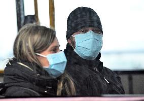 A passenger wearing face mask at the Brno Turany Airport