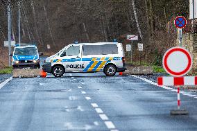 Czech police patrol watch at the closed border crossing Hrensko-Schmilka