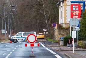 Czech police patrol watch at the closed border crossing Hrensko-Schmilka