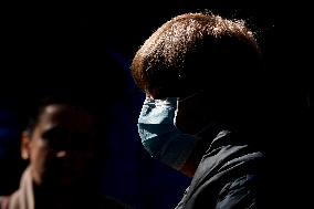 Vaclav Havel Airport Prague, woman, protective medical mask, coronavirus