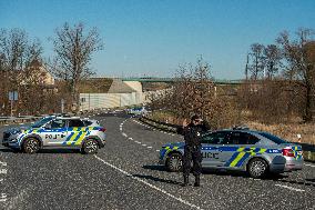 Czech police patrol watch at the closed border crossing Hradek nad Nisou-Porajow