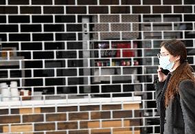 Vaclav Havel Airport Prague, coronavirus, protective medical mask, woman