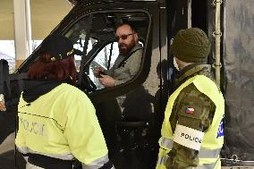 Czech soldiers help police officers guard the Mikulov-Drasenhofen border crossing