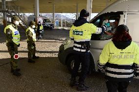Czech soldiers help police officers guard the Mikulov-Drasenhofen border crossing