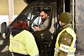 Czech soldiers help police officers guard the Mikulov-Drasenhofen border crossing