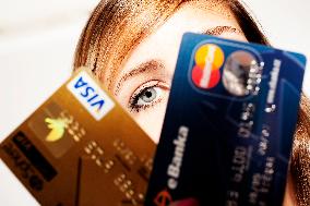 woman with credit and debit card, VISA, Mastercard