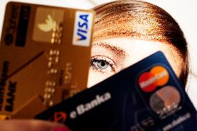 woman with credit and debit card, VISA, Mastercard