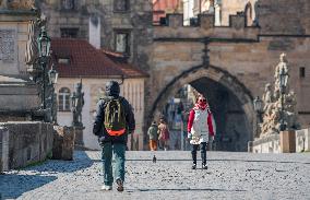 Charles Bridge, face masks, pedestrians, veil, medical masks, empty city center, Prague