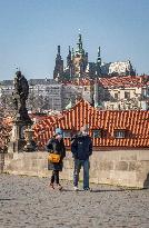 Charles Bridge, without tourists, face masks, pedestrians, veil, medical masks, Prague Castle