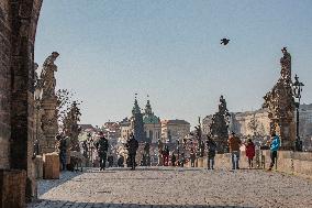 Charles Bridge, face masks, pedestrians, veil, medical masks, empty city center, Prague