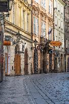 empty street, Prague city center without tourists, closed shops,