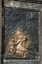 Place where touch makes good luck on the Charles Bridge, St. John of Nepomuk, plaque