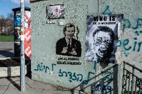 Kampa, Badiucao, WHO IS DR. LI WENLIANG poster, Vaclav Havel portrayed on a wall in Kampa Island with writing LIFE IS MYSTERY, HIS LIFE IS HISTORY