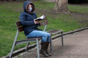a woman with a protection face mask