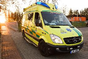 special infectious ambulance, paramedics in a protective suits, paramedic, suit