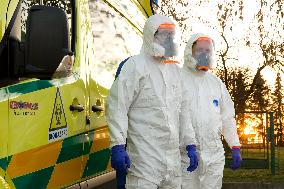special infectious ambulance, paramedics in a protective suits, paramedic, suit, biological hazard, biohazard