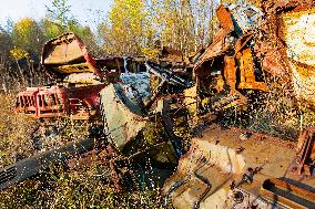 Chernobyl zone, restricted territory, Rasocha a radioactive cemetery of vehicles