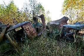 Chernobyl zone, restricted territory, Rasocha a radioactive cemetery of vehicles