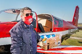 pilot Pavel Kratochvil landed with an aircraft loaded with boxes with masks and respirators, medical supplies