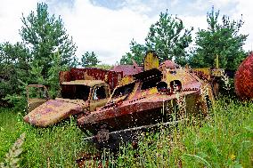Chernobyl zone, restricted territory, destroyed military vehicle